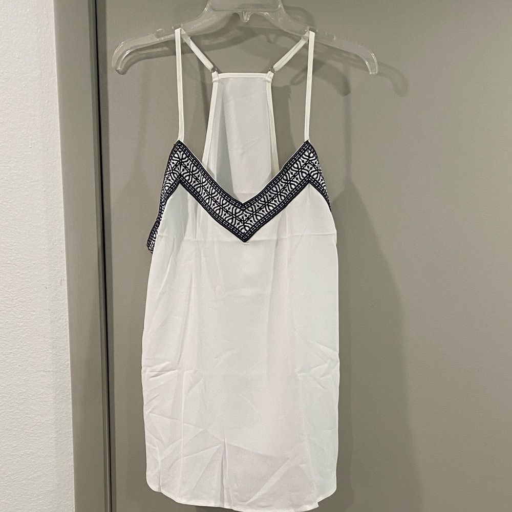 White Sleeveless Top with Black Trim